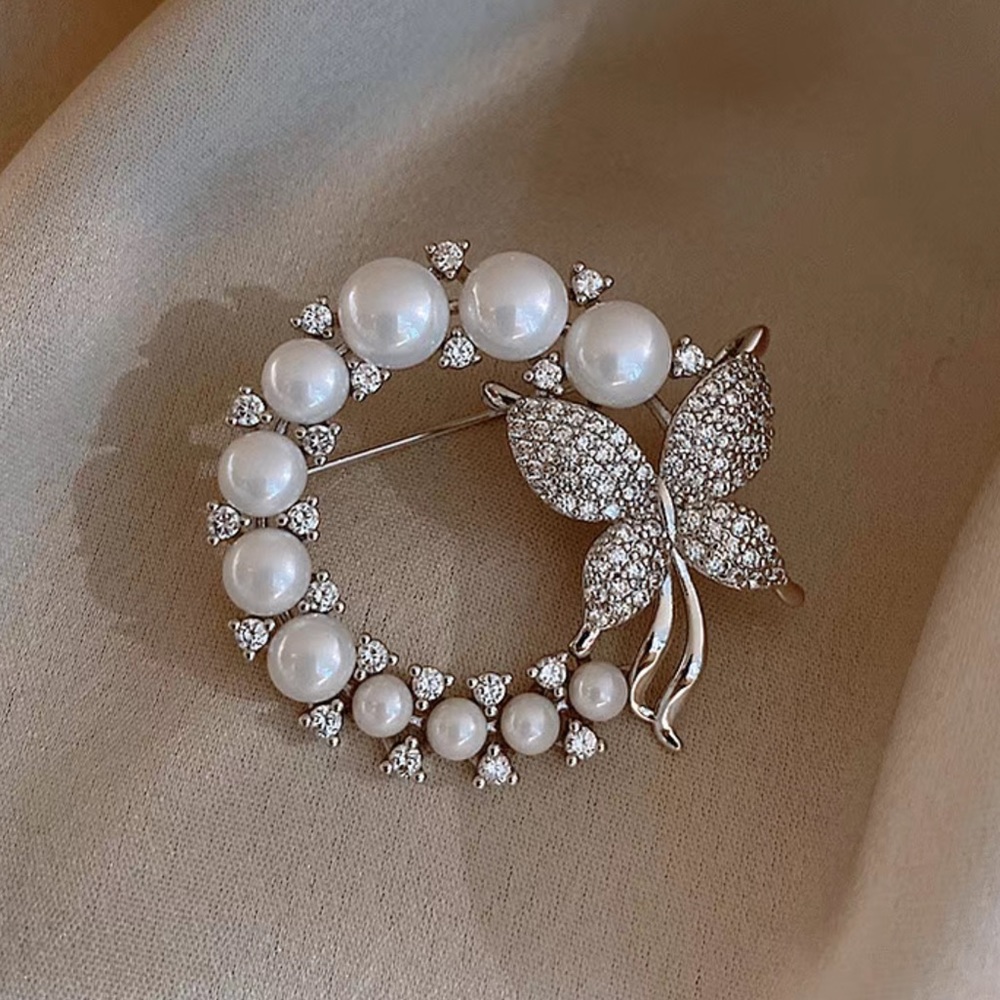 Winter Silver plated Hollow Pearl Butterfly Brooch